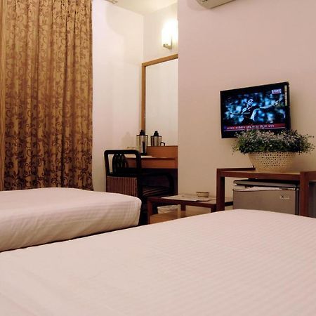 The Ambience Hotel Púna Pokoj fotografie